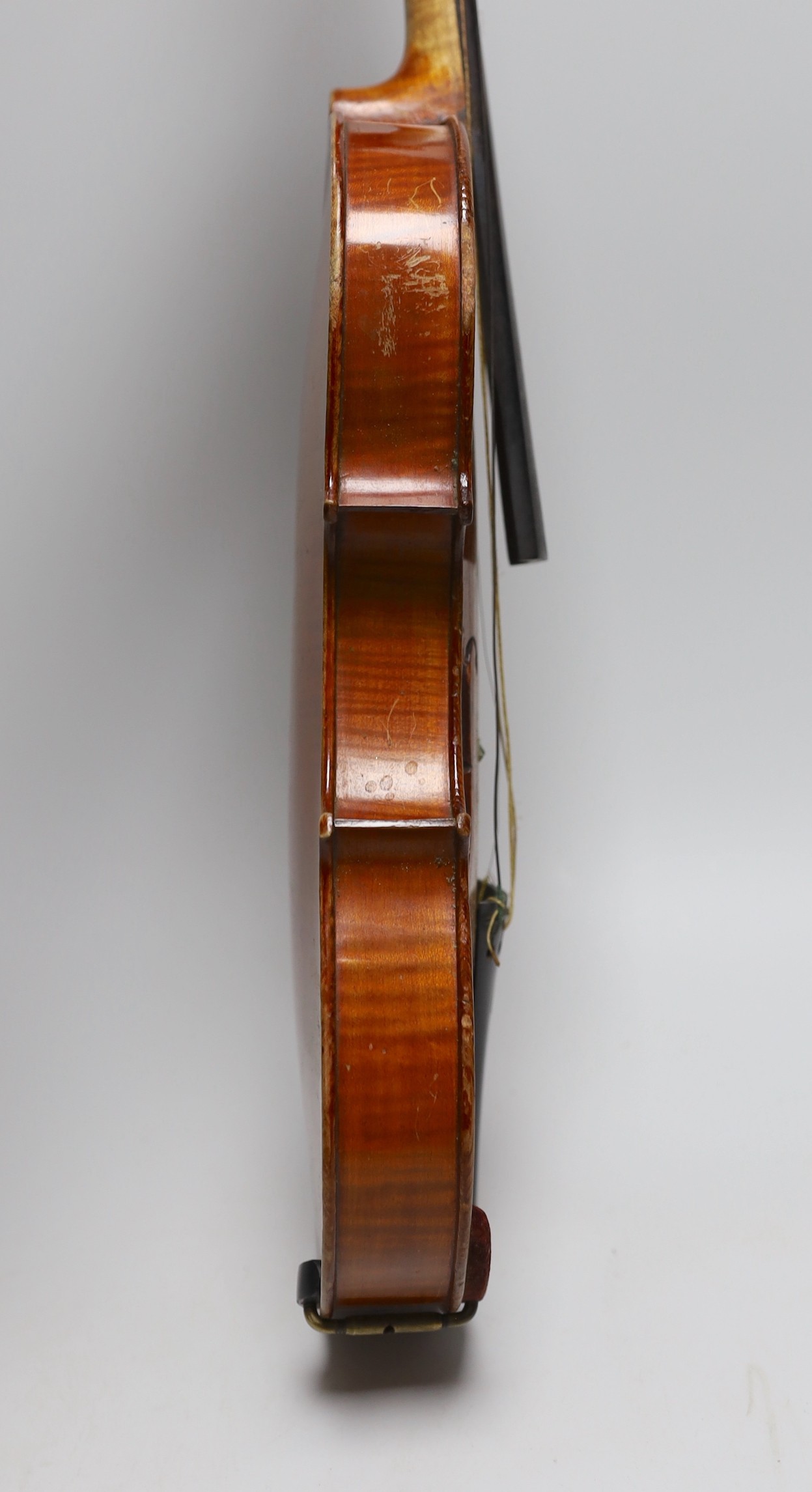 A cased 19th century French violin, back 34cm